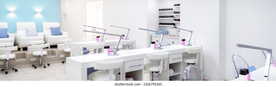 Nail Salon Bright Interior. Panoramic View Of Modern Manicure Shop. Horizontal Banner With Spa Room. Inside Beauty Studio With White Design. Clean Empty Trendy Nail Salon.