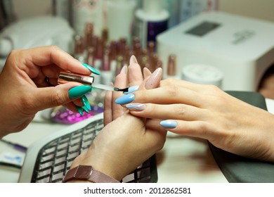 Nail Stylist Doing A Manicure