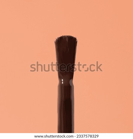 Nail varnish brush in shades of brown