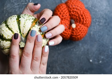 Nails And Autumn Pumpkins. Place For Text. Autumn Beauty Concept.