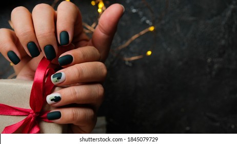 Nails With Christmas Lights. Place For Text. Cozy Winter Nails.