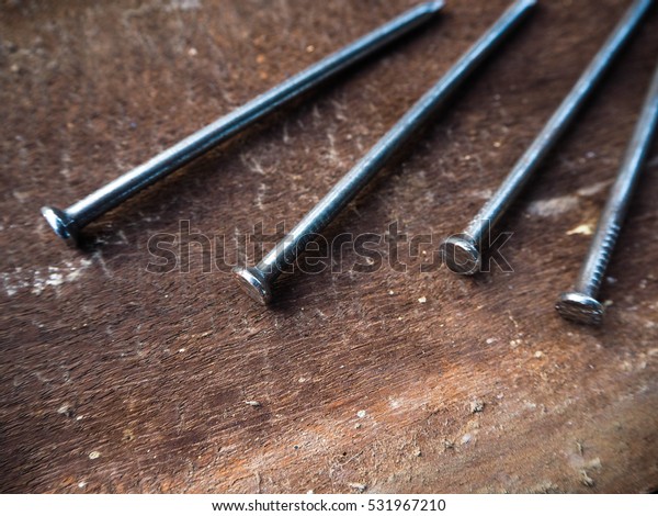 Nails On Wooden Floor Steel Nails Stock Photo Edit Now 531967210
