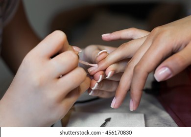 Nails Saloon Woman Applying Nail Polish