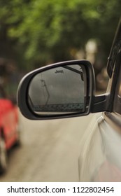 Nainital, Uttarakhand/India - June15, 2018: A Jeep Compass rear view mirror.