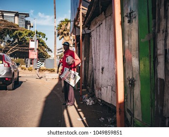 Nairobi / Kenya - 9/02/2018 : Man Selling Newspapers On The Road.