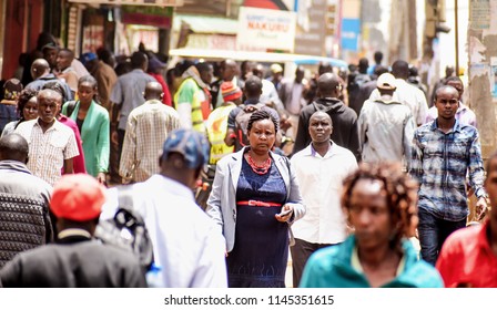 Nairobi, Kenya - April 28 2018: People Walking Along A Busy Street In The Crowded Down Town Of Nairobi City, Kenya, East Africa