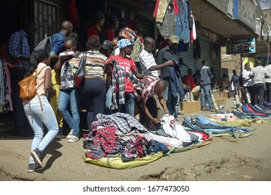 Nairobi, Kenya - February 14, 2018: People Shop At Road-side Market Stalls.