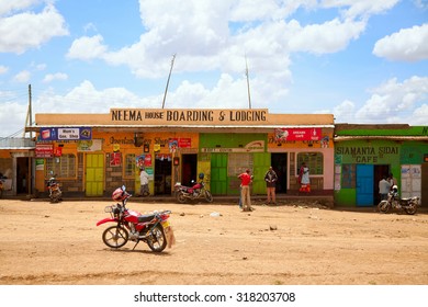 Nairobi, Kenya - February 19, 2012 : Local Kenyan People Near A Small Shop On The Road To Nairobi