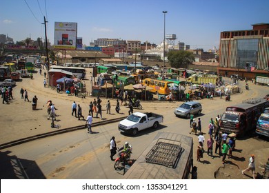 Nairobi, Kenya - January 17, 2015: A Busy Street Full Of Public Transport, Buses, Cars, Motorcycles And Pedestrians. View From Above