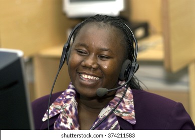 NAIROBI, KENYA-MARCH 27, 2006: Kenyan Young Woman Working In A Call Center, In Nairobi