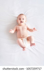 Naked Baby Lying On Back 