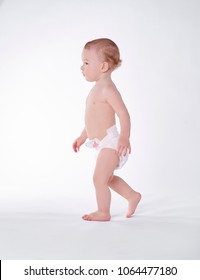 Naked Baby Walking At Studio Shot 