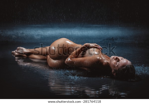 Nude in the rain
