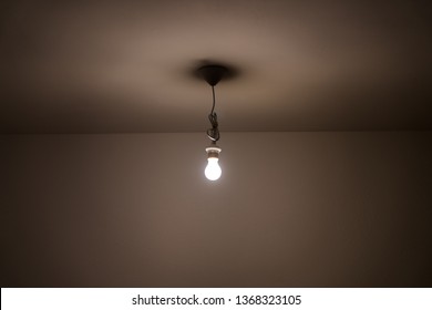 Naked Lit Light Bulb Hanging Ceiling Foto Stok Shutterstock