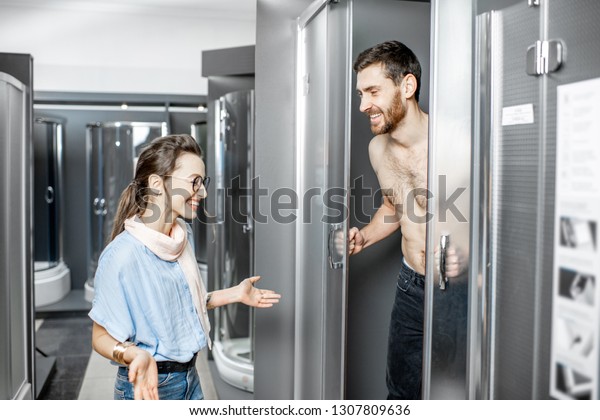 Naked Man Looking Out Shower Cabin Royalty Free Stock Image