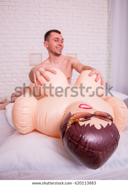 Naked Man Touches Breasts Inflatable Doll Stock Photo Edit Now