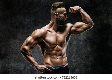 Naked Strong Man Showing His Biceps Stock Photo Edit Now