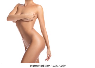 Naked Woman Covering Her Beautiful Body With Hands On White Background