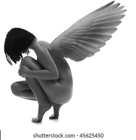 Naked young beauty woman with wings  at white background