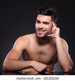 Стоковая фотография Naked babe Man Sitting Desk Leaning Shutterstock