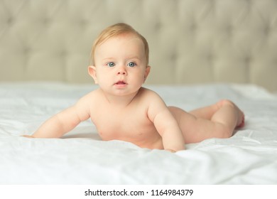 Naket Lovely Little Baby Laying On Th White Cover Naket Lovely Little Baby Laying On Th White Cover