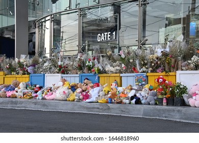 Nakhon Patchasima (Korat), Thailand - Feb 14, 2020 : Thai mourners leave flowers and toys in front of Terminal 21 following the mass shooting on February 10, 2020. 26 people were killed.