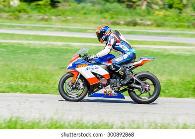 NAKHON PATHOM - JULY 25 : Thaworn P. With Kawasaki Ninja Motorcycle In Thailand SuperBikes Championship 2015 Round 1 At Thailand Circuit, On July 25, 2015 In Nakhon Pathom, Thailand.