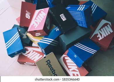 NAKHON PATHOM, THAILAND-MAY 31, 20120 : Multi brand sneaker boxes Stacked which is a popular brand of sports shoes.