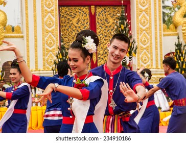 NAKHON PHANOM ,THAILAND-OCTOBER 8: Thai dancers perform Thai dancing in front of Pratat Pranom pagoda on 8 October 2014 at Nakhon Pranom ,Thailand.Pratat Pranom pagoda is very important for buddhism.