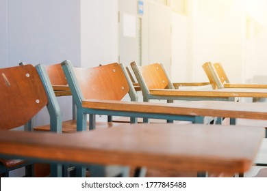 Nakhon Ratchasima, Thailand, 8 July 2020: The Color Of The Morning Orange And Blurred With The Atmosphere In The Classroom In The Elementary School That Has Tables And Chairs, Classic Old Vintage Styl