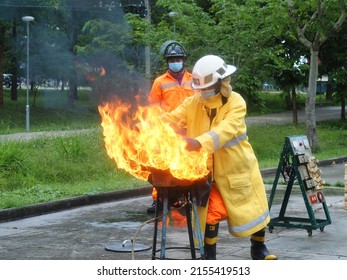 Nakhon Ratchasima, Thailand - 8 May 2022: Fire Fighting Training For Class K Fuel In Basic Fire Training For Occupational Health And Safety Students. Suranaree University Of Technology, Thailand.