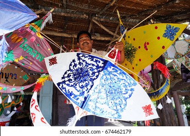 Nakhon Si Thammarat ,Thailand -January 28, 2014 :a Man Is Making The Traditional Kite Wau Bulan Or Moon Kite At Nakhon Si Thammarat ,Thailand