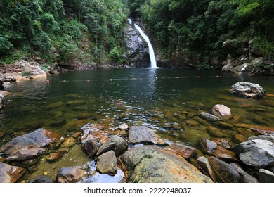 Nakhonsrithamarat,Thailand,Woman relax and happy time on Yong waterfall in sunny day,unseen place in Nakhon Si Thammarat province, south Thailand - Shutterstock ID 2222248037