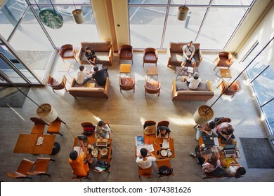 Nakornpratom, Thailand:April 22,2018- Top View Of Starbucks Coffee In The Sunny Day. Co-working Space Concept