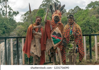 NAKURU, KENYA - MAY 2014: Portrait of Kenyan warrior with traditionally painted face,review of daily life of local people,near to Lake Nakuru National Park Reserve