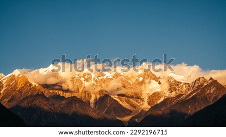 Namcha Barwa, golden snow mountain,at the confluence of the Himalayas and Nyenchenthanglha Mountains, Tibet, China.