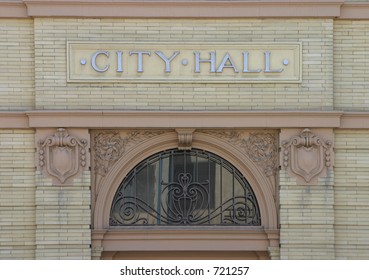 The nameplate above the entrance to a small town's city hall.