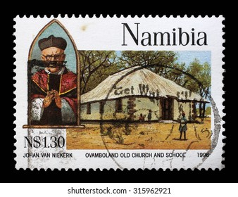 NAMIBIA - CIRCA 1966: A Stamp Printed In Namibia Shows Archbishop Joseph Gotthardt, Ovamboland Old Church And School, Circa 1966.