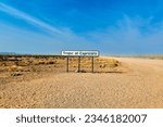 Namibia. Driving on a dirt road, crossing the Tropic of Capricorn