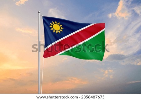 Namibia flag waving on sundown sky