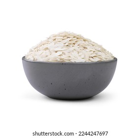 For Namkeen Chivda snacks, raw flattened rice, thick or thin rice flakes, or Aloo Poha for Indian breakfast, all served in a bowl. Against a white background, alone. - Powered by Shutterstock