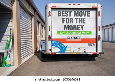 NAMPA, IDAHO - AUGUST 22 2021: Uhaul Trailer Next To An Open Self Storage Shed