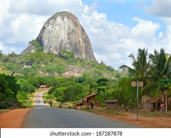 NAMPULA, MOZAMBIQUE - 6 DECEMBER 2008: The Fantastic Nature Of Mozambique. The Road In Nampula, Mozambique - 6 December 2008. The Village, Apartment House. The Villagers Go About Their Business.