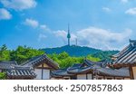 Namsangol Hanok Village and Namsan Mountain,Namsan tower view in summer, Seoul, South Korea.