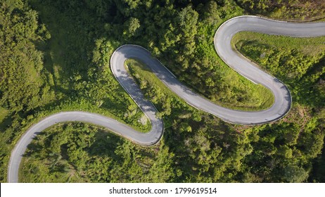 Nan, Thailand. Aerial view of Beautiful sky road over top of mountains with green jungle. Road trip on mountain.