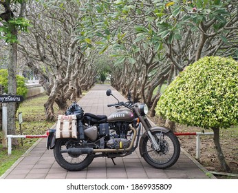 Nan, Thailand - December 7, 2020 : Photo of Motorbike Royal Enfield of travelers taking a break at Nan, Thailand.