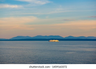 NANAIMO, BC - JUNE 19, 2018: A BC ferry sailing at sunset in Nanaimo. BC ferries provides all major ferry services for coastal and island communities in BC.