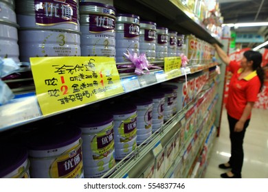 NANCHANG CHINA-September 9, 2012, Jiangxi, Capital Of Nanchang, The Supermarket Is Filled With Chinese Made And Imported Children's Milk Powder, To Attract Consumers To Buy.