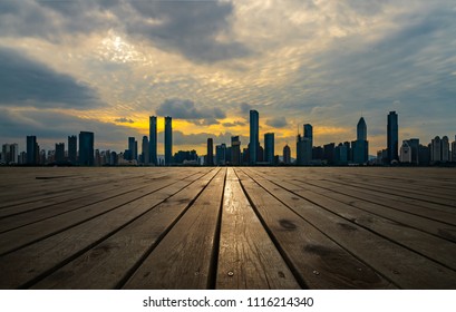         Nanchang Honggutan city view and wooden floor walkway                        - Shutterstock ID 1116214340