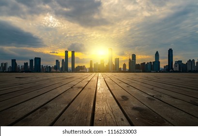           Nanchang Honggutan city view and wooden floor walkway                 - Shutterstock ID 1116233003